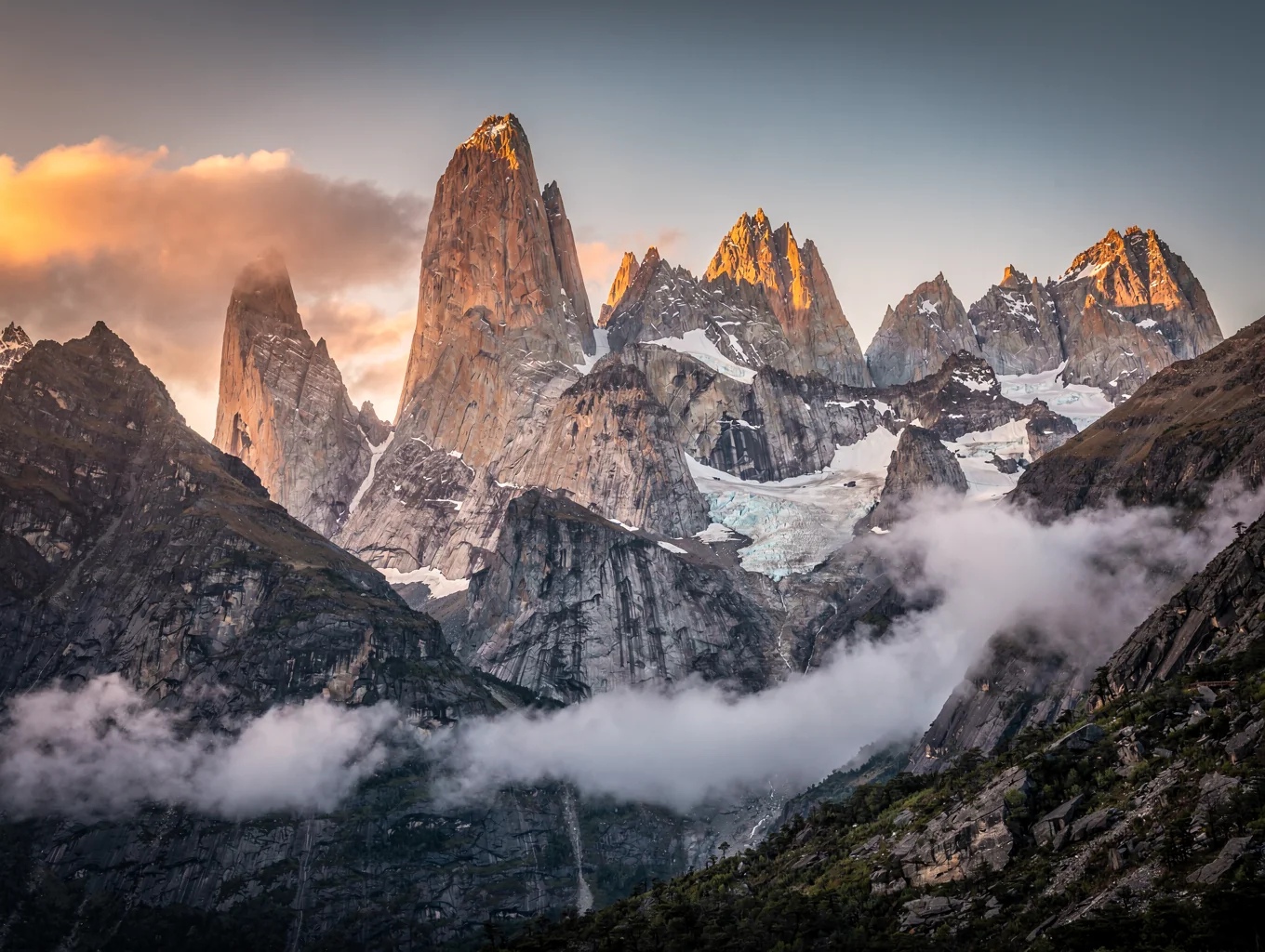 Monumental Patagonian granite towers and glacial lake at twilight